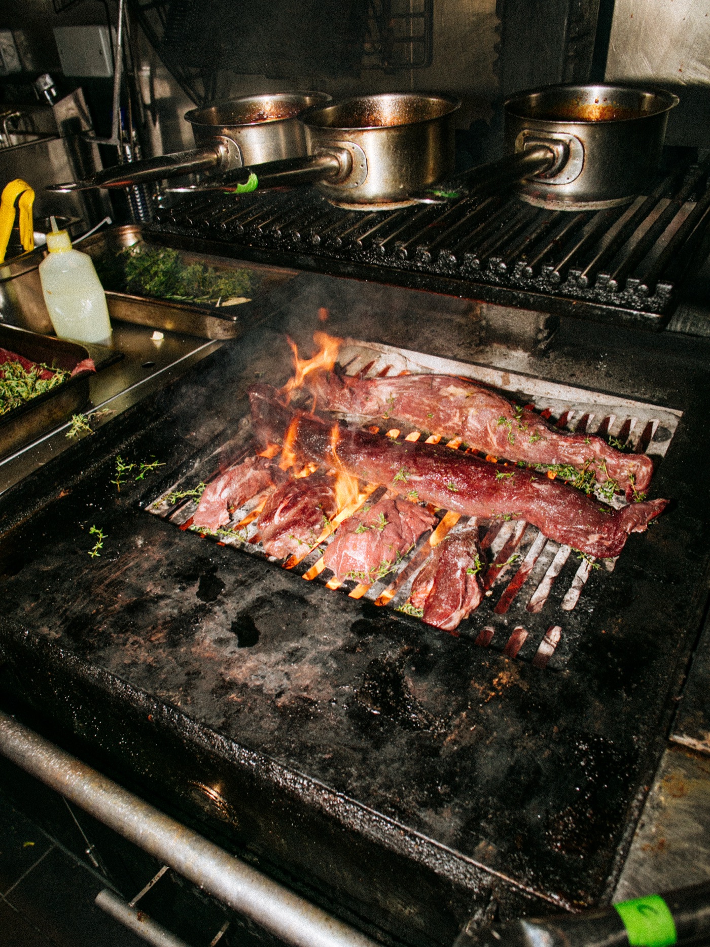 Flames on the grill in the kitchen